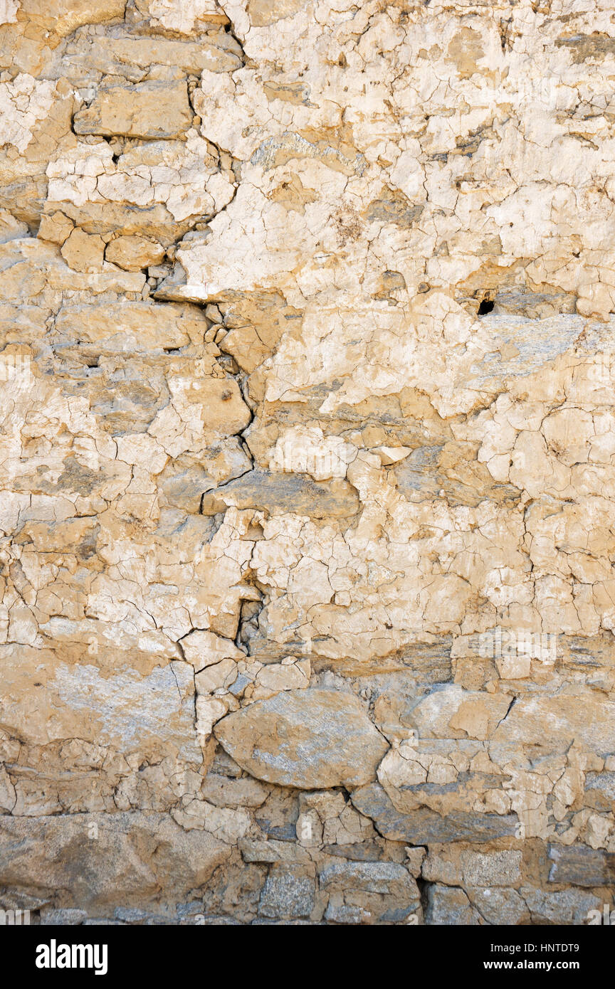 Vieux Mur de pierre plâtre fissurée texture d'arrière-plan Banque D'Images