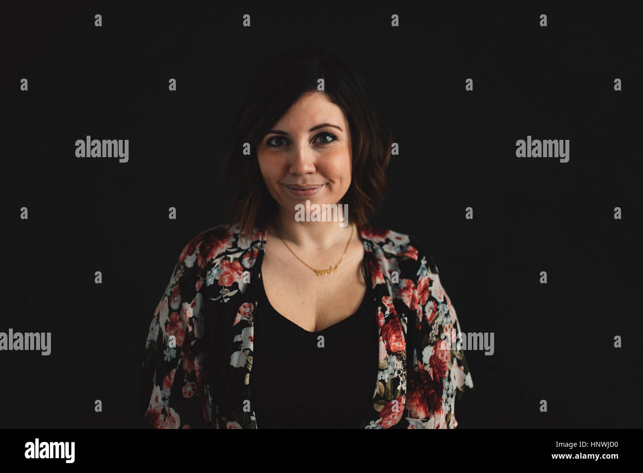 Portrait de femme, fond noir Banque D'Images