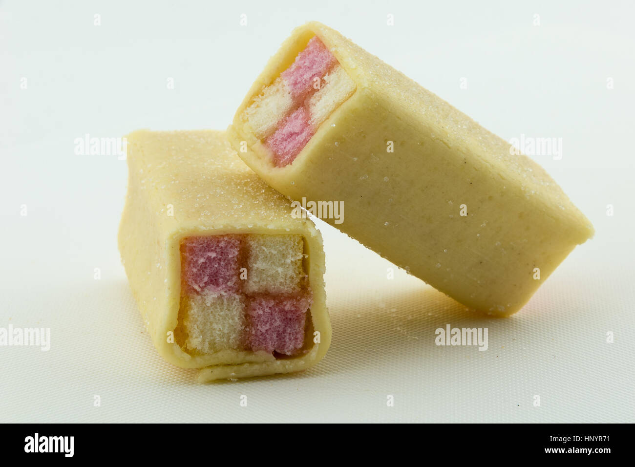 Deux Battenberg cake on a white background Banque D'Images