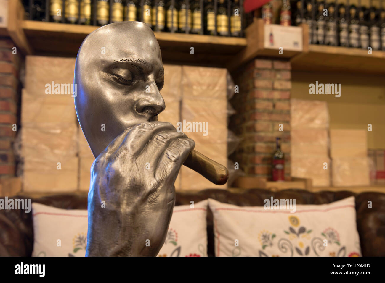 Une statue de métal du cigare Banque D'Images