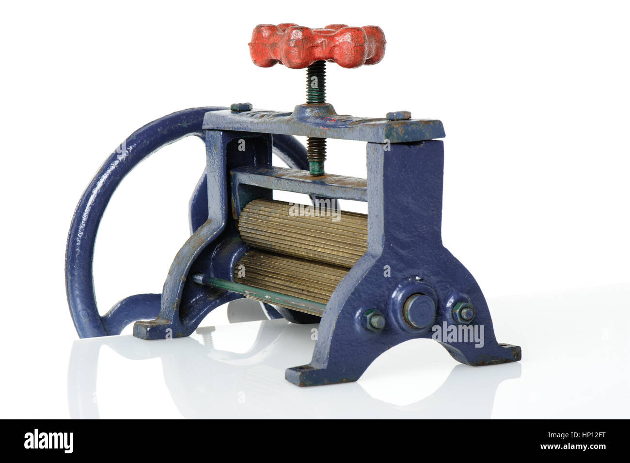 Vieille presse manuelle machine pour la canne à sucre et le calmar à sec en  fonte et laiton Photo Stock - Alamy