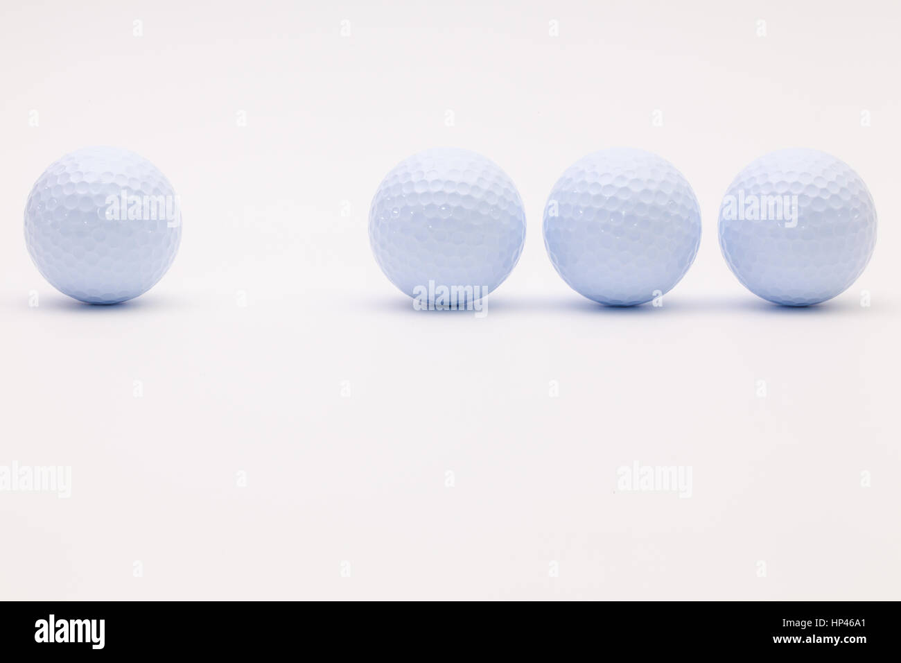 Balles de golf blanc sur le fond blanc.Golf concept. Banque D'Images