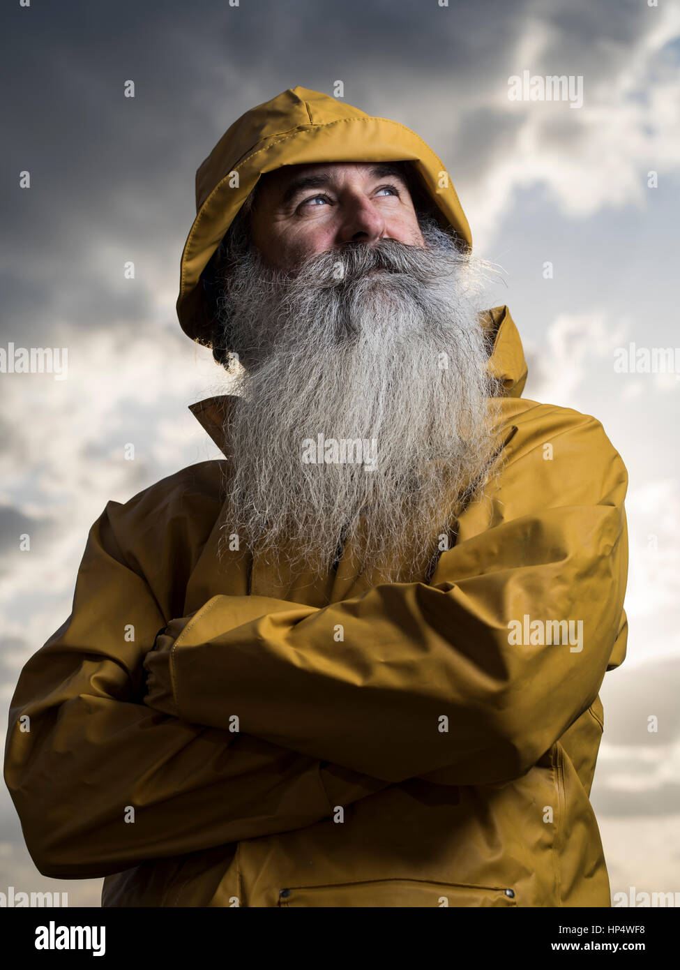 Pêcheur avec yellow jacket Banque D'Images