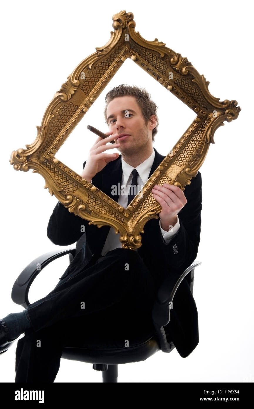 Businessmann mit Zigarre im Goldrahmen - business man dans cadre doré Banque D'Images