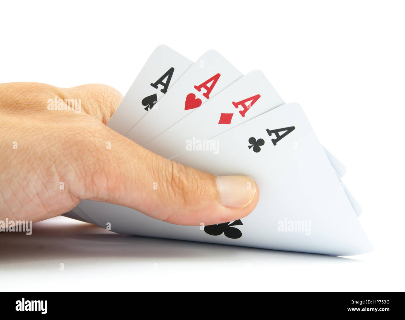 Cartes à jouer dans la main isolé sur fond blanc Banque D'Images