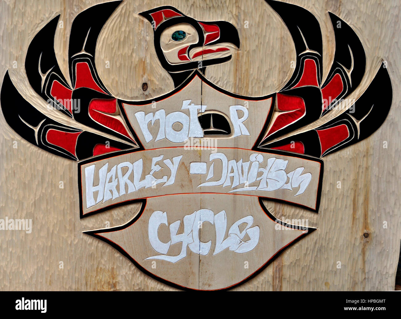 Harley Davison logotimo sculpté sur bois en saxman, Alaska Banque D'Images