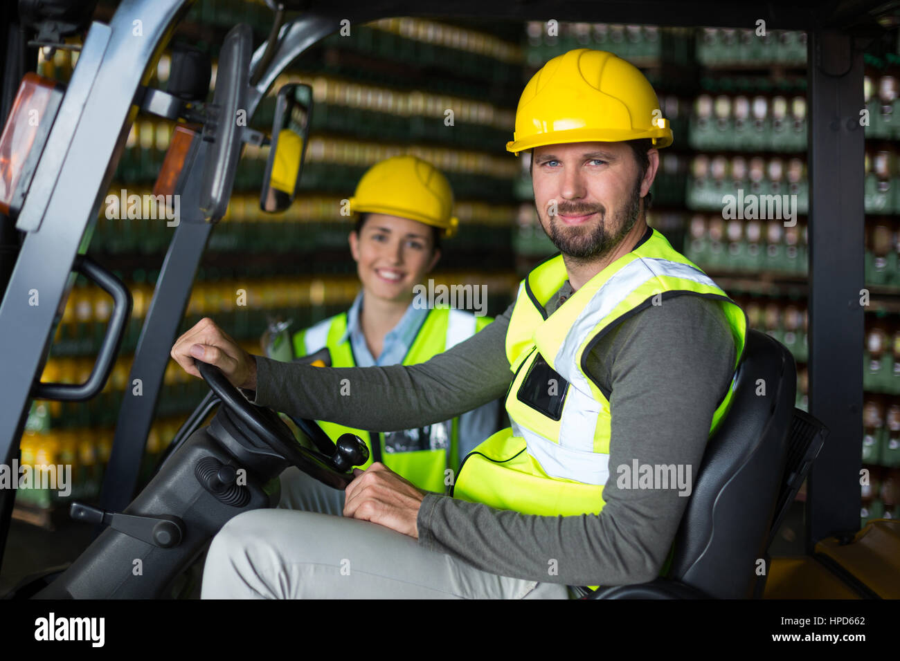 Portrait of smiling les ouvriers d'usine en usine Banque D'Images