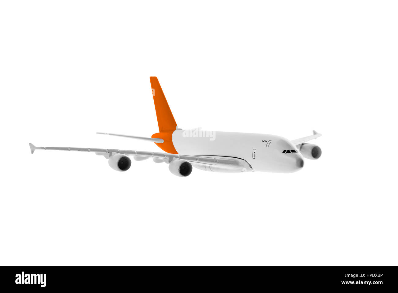 Avion de couleur orange, isolé sur fond blanc. Banque D'Images