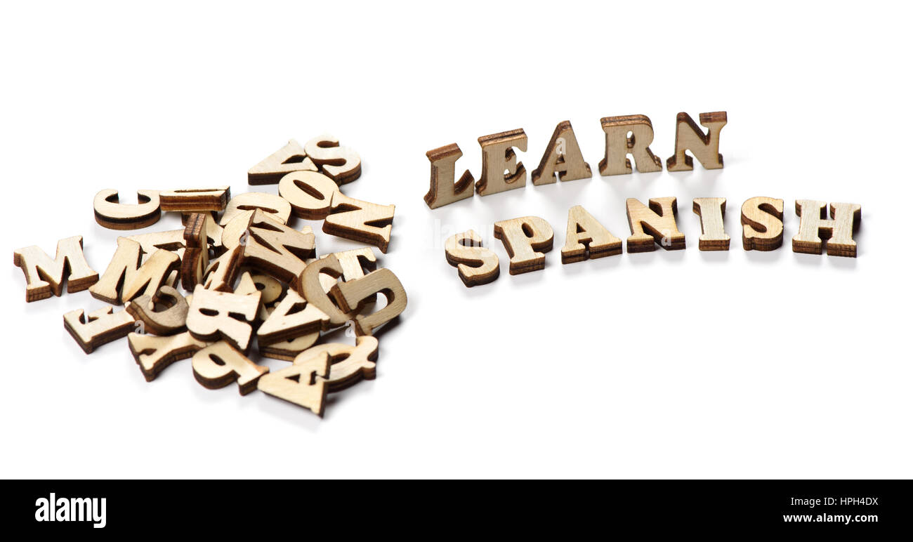 Apprendre l'espagnol concept. sol en bois lettres sur un fond blanc Banque D'Images