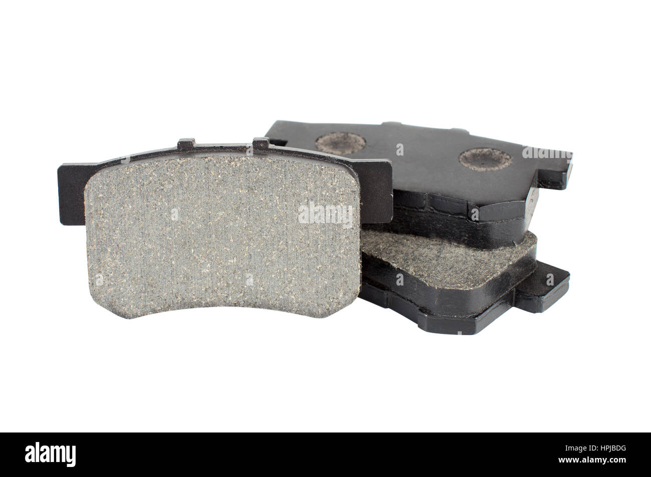 Plaquettes de frein isolé sur fond blanc. Location de pièces de fer pour les freins de service. Banque D'Images