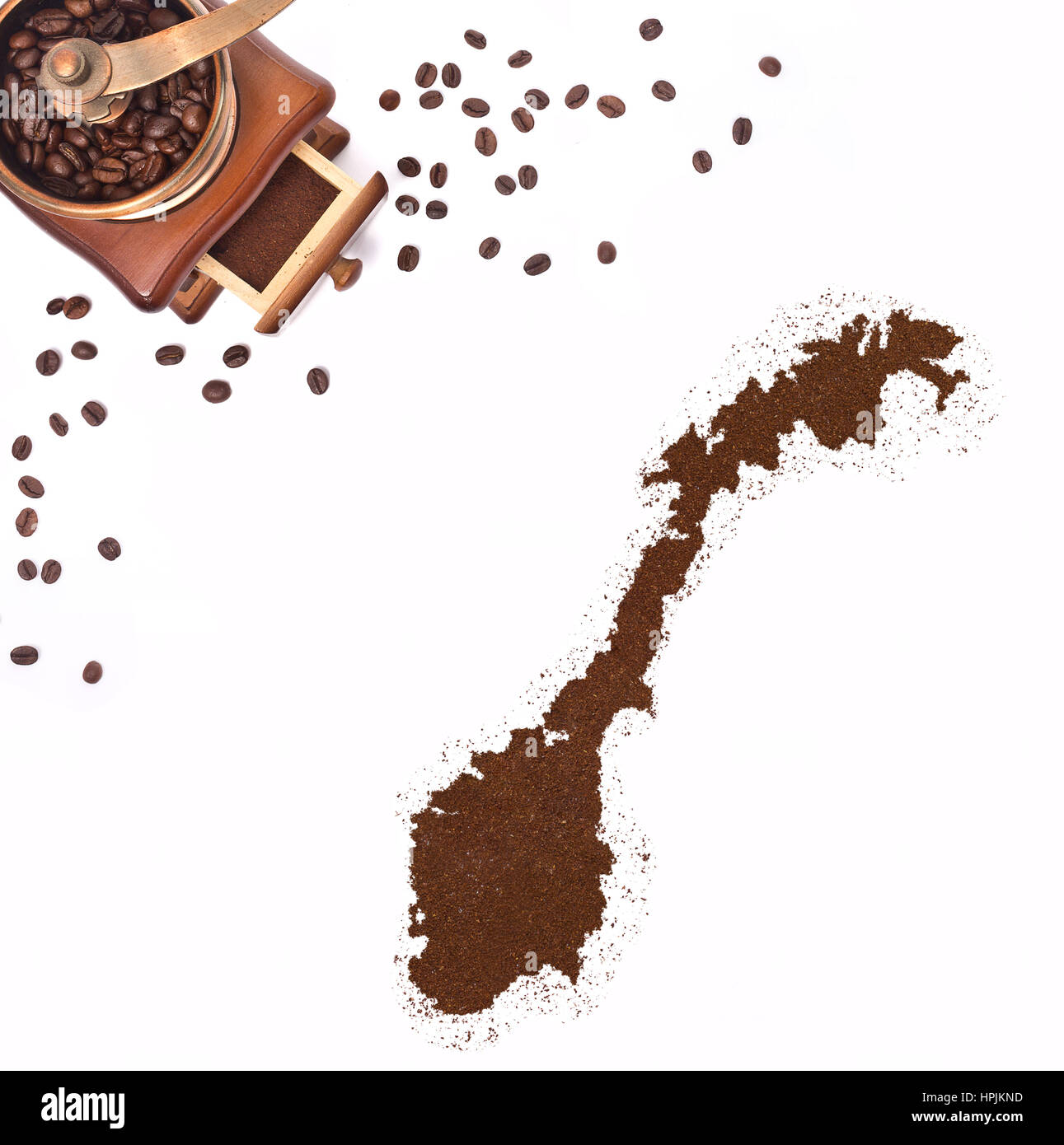 La poudre de café dans la forme de la Norvège et un moulin à café décoratif(série) Banque D'Images