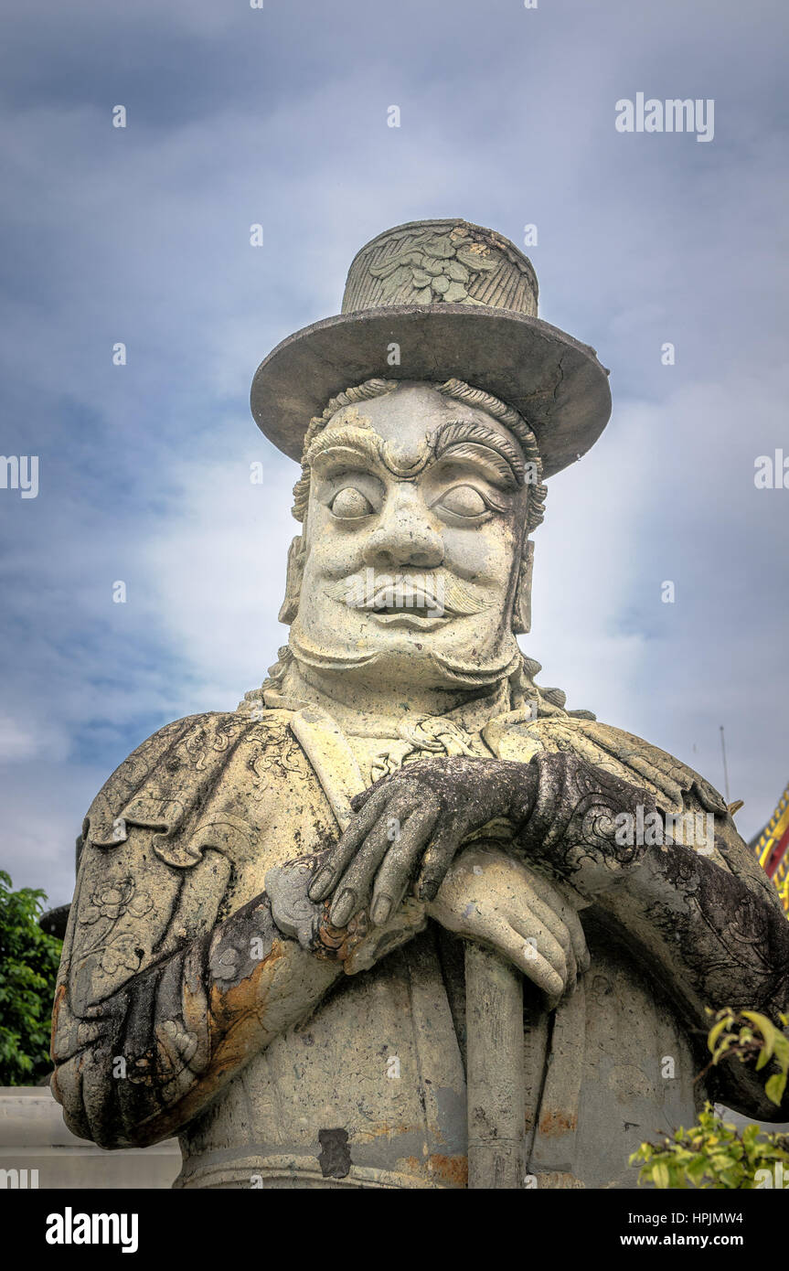 Statue de pierre chinois dans le Wat Pho, Bangkok, Thaïlande Banque D'Images