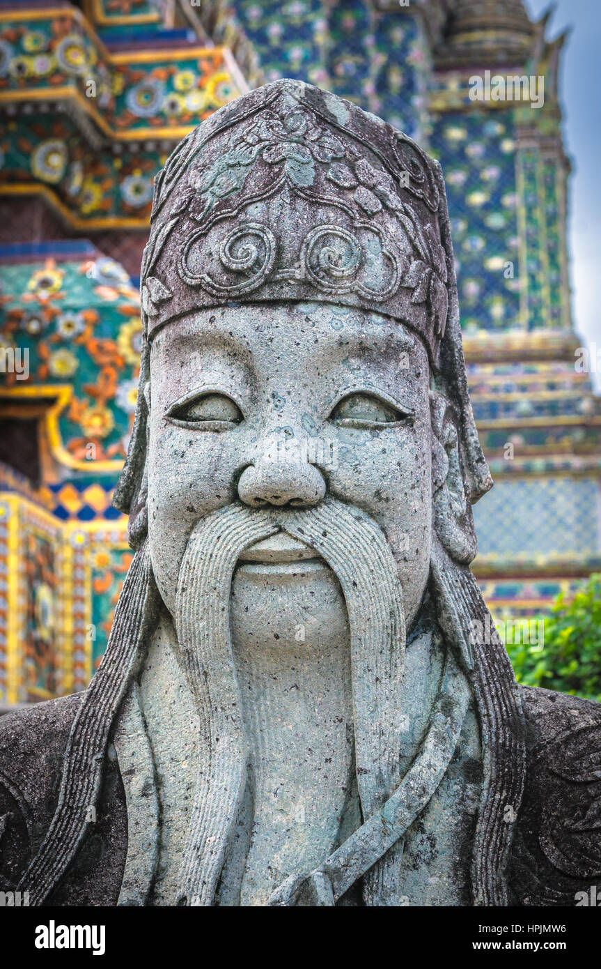 Statue de pierre chinois dans le Wat Pho, Bangkok, Thaïlande Banque D'Images