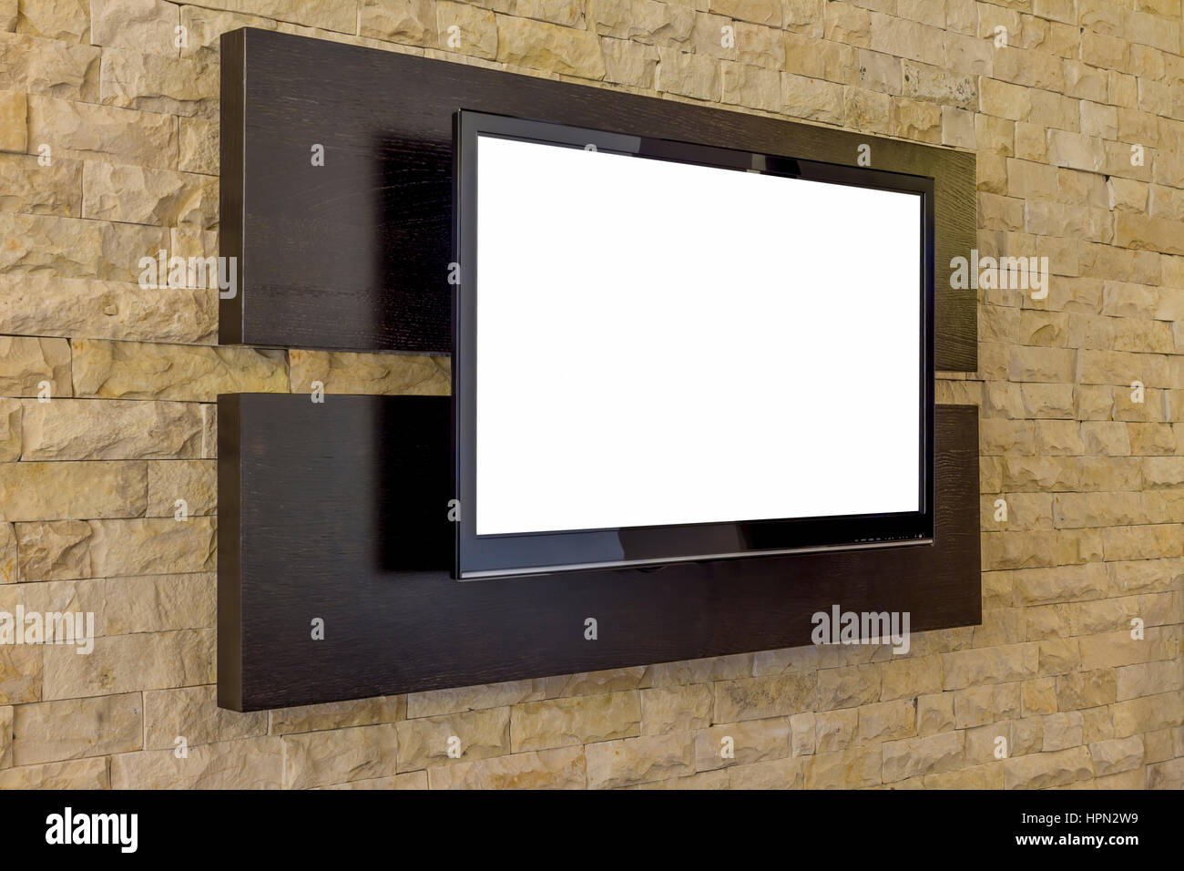 Écran de télévision sur le nouveau mur arrière-plan. Salon moderne - intérieur plat sur mur de brique Banque D'Images