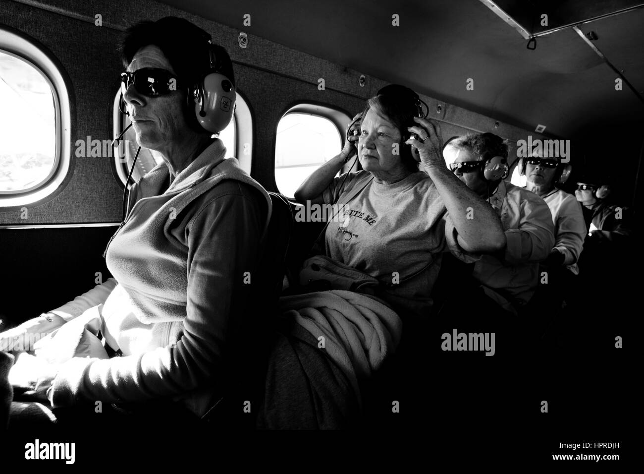 Les touristes profiter un vol voyage touristique autour de Denali National Park et le Mont McKinley en Alaska, États-Unis. Banque D'Images