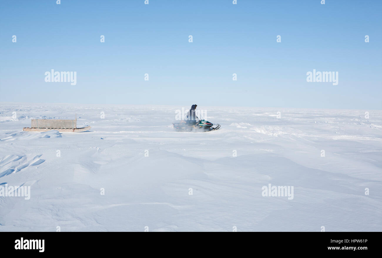 Scooter de neige au pôle nord Banque D'Images