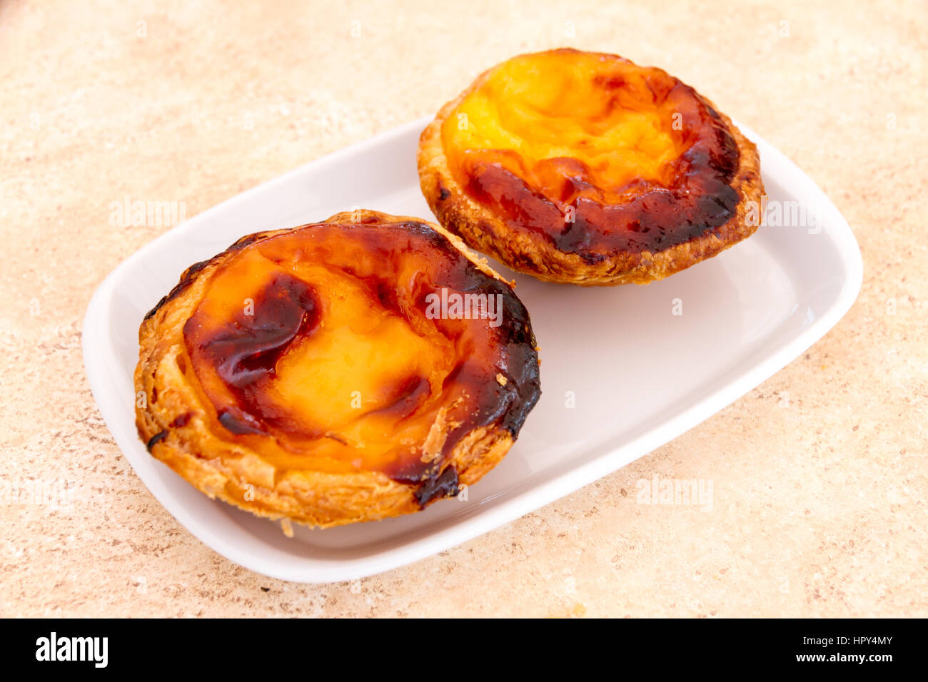 Pastel de nata est une pâtisserie tarte aux oeufs portugais célèbre dans le monde Banque D'Images