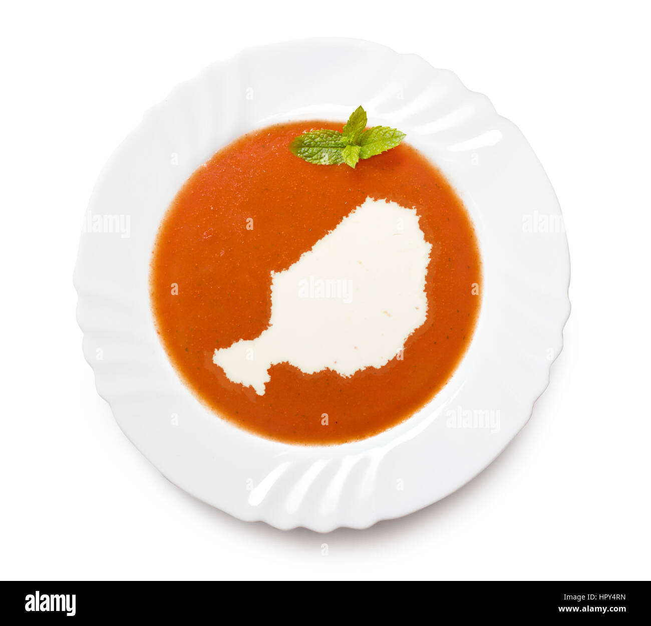 La plaque d'une soupe de tomate avec la crème dans la forme du Niger.(série) Banque D'Images La plaque d'une soupe de tomate avec la crème dans la forme du Niger.(série) Banque D'Images