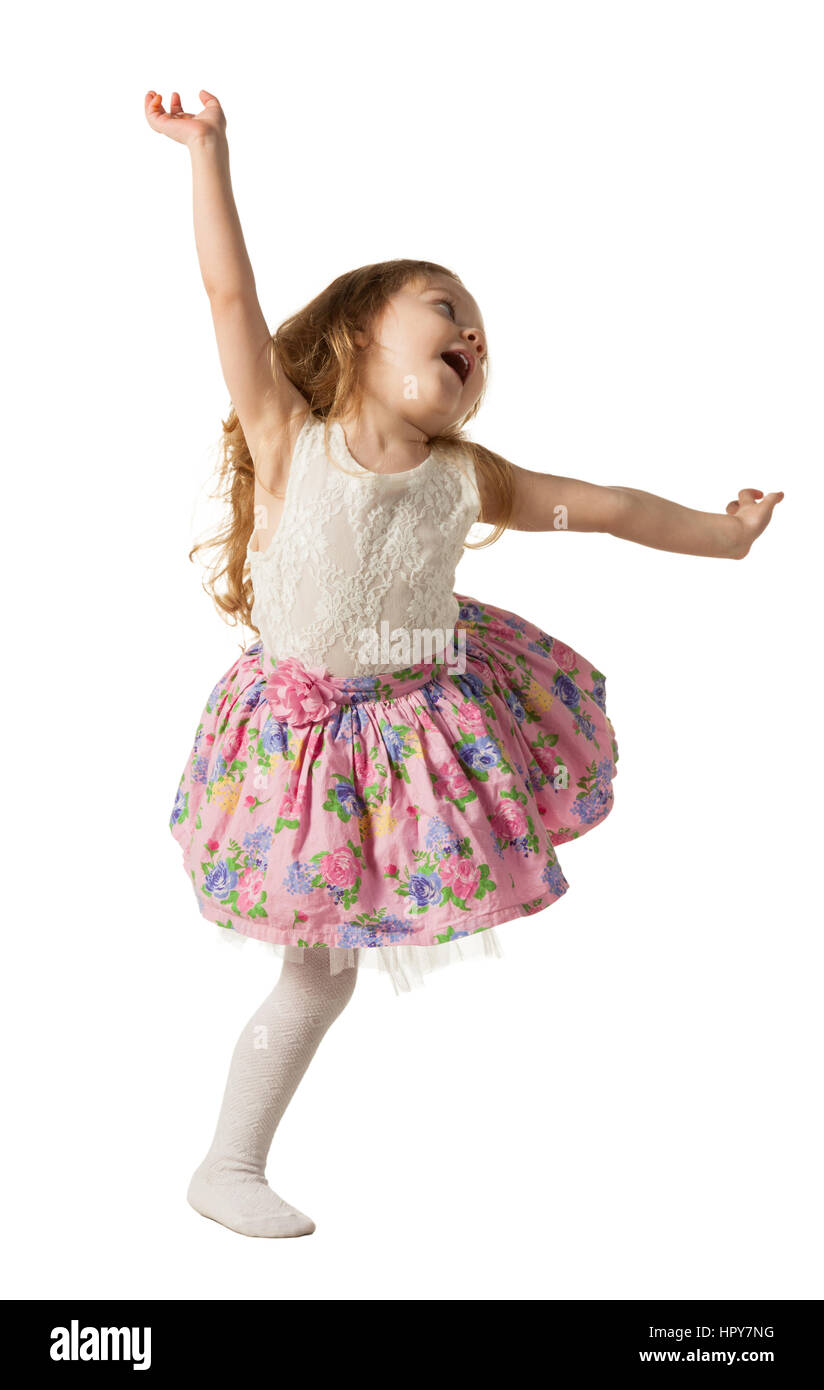 Petite fille mignonne sauter, courir, danser, s'amuser. Isolé sur fond blanc Banque D'Images