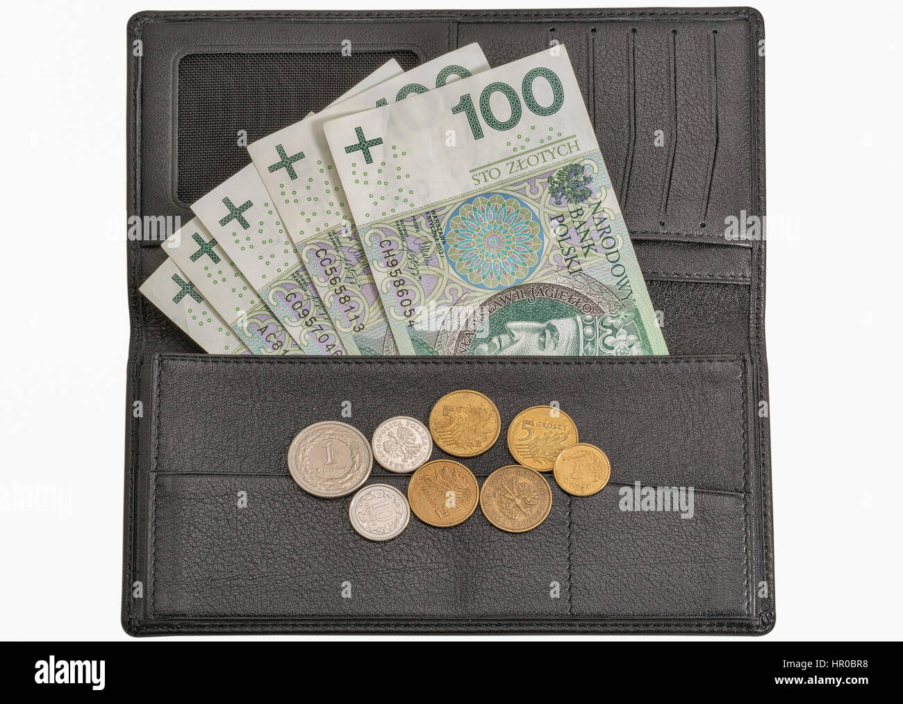 Zloty polonais d'une centaine de pièces et billets en pochette de cuir noir homme isolé sur fond blanc Banque D'Images