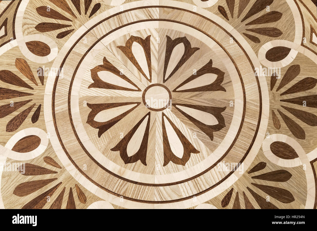 Fragment d'une peinture sur panneau avec un beau modèle de couleur différente et la texture du bois. Banque D'Images