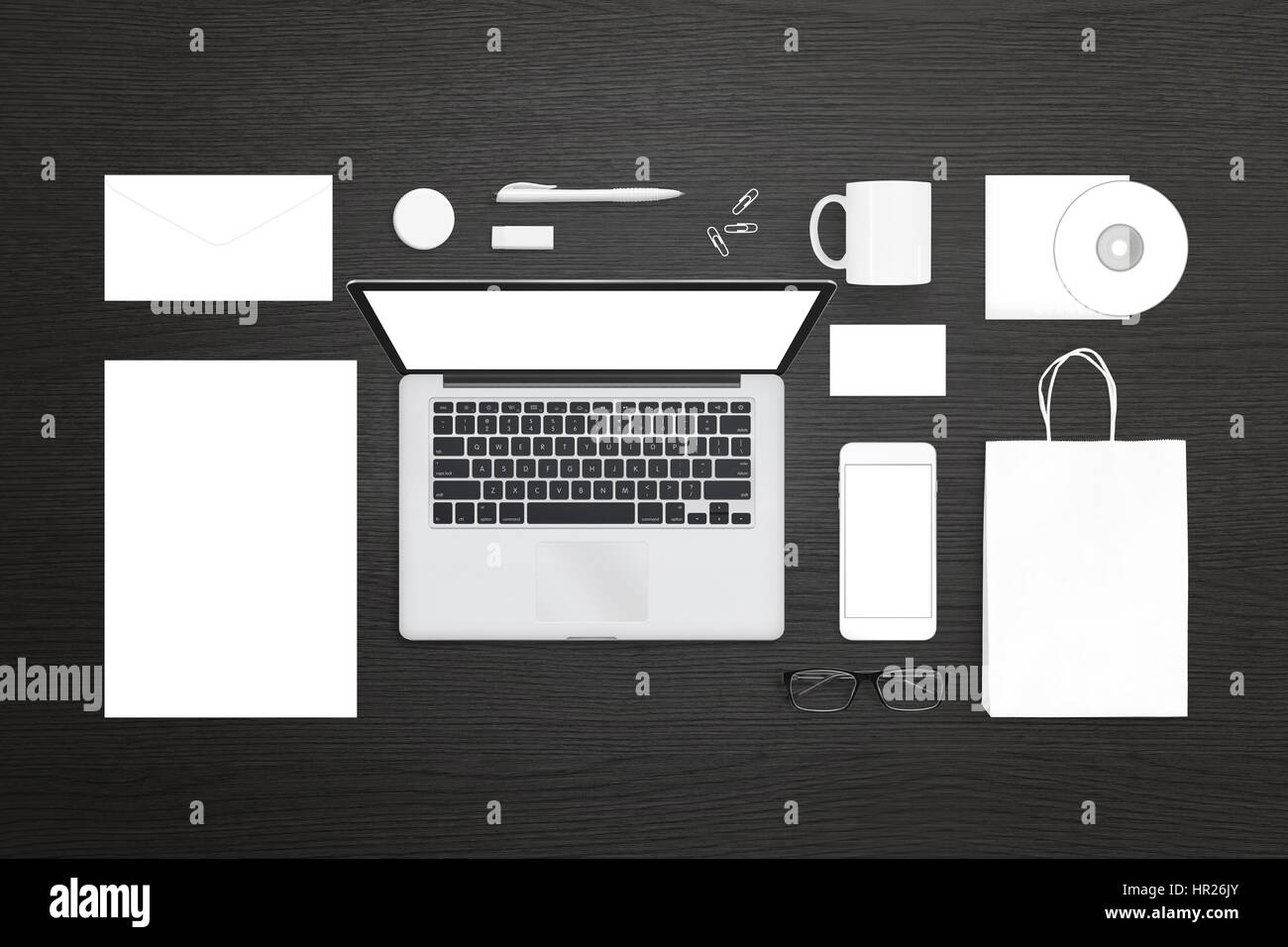 Conception d'identité visuelle présentation modèle. Vue de dessus de l'ordinateur portable, téléphone mobile, papeterie et fournitures de bureau. Vue de dessus de bureau en bois noir Banque D'Images