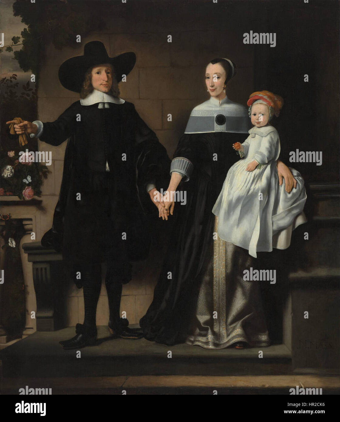 Nicolaes MAES Portrait d'un couple marié avec un enfant Banque D'Images