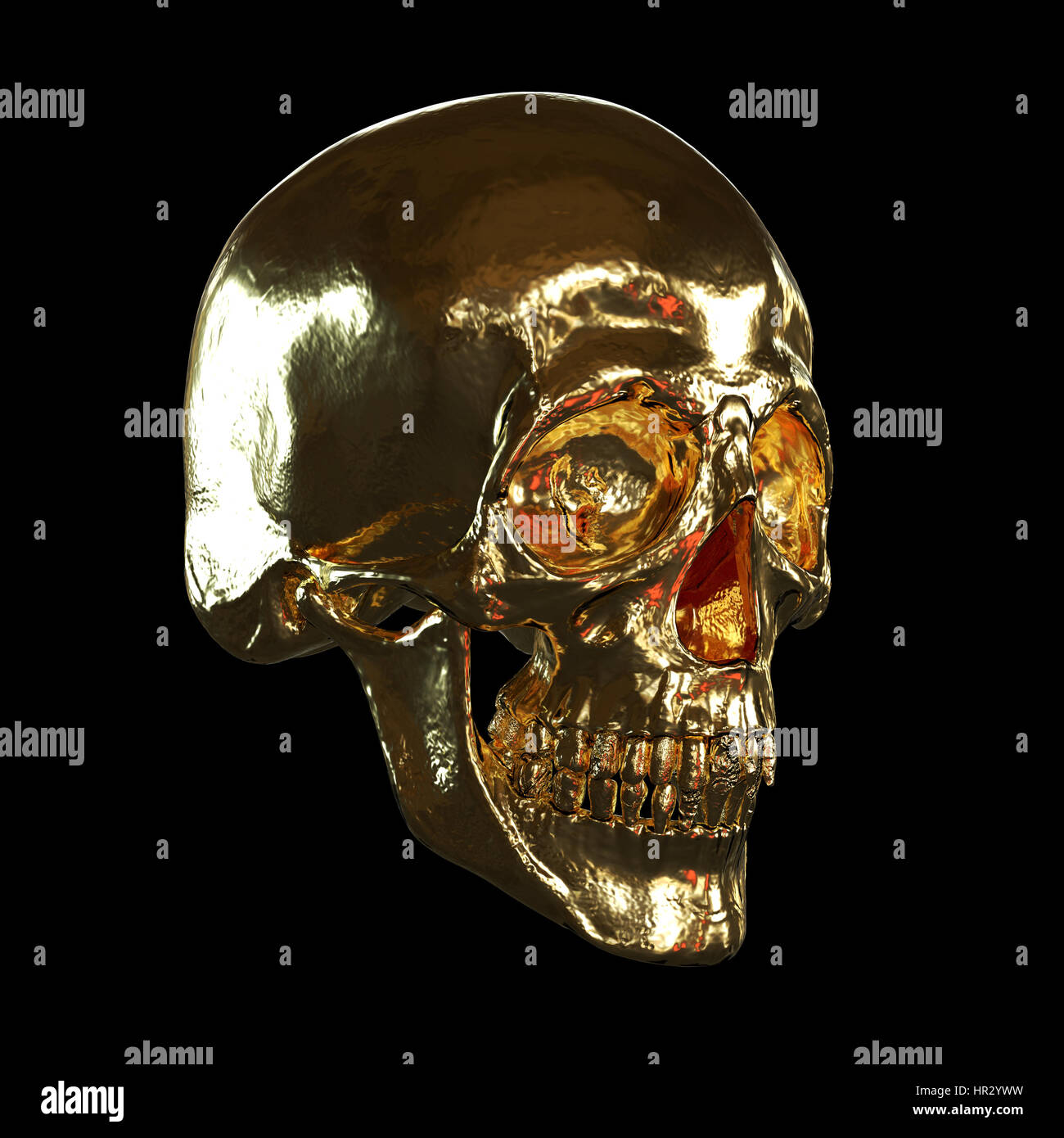 Crâne doré isolé sur fond noir Banque D'Images