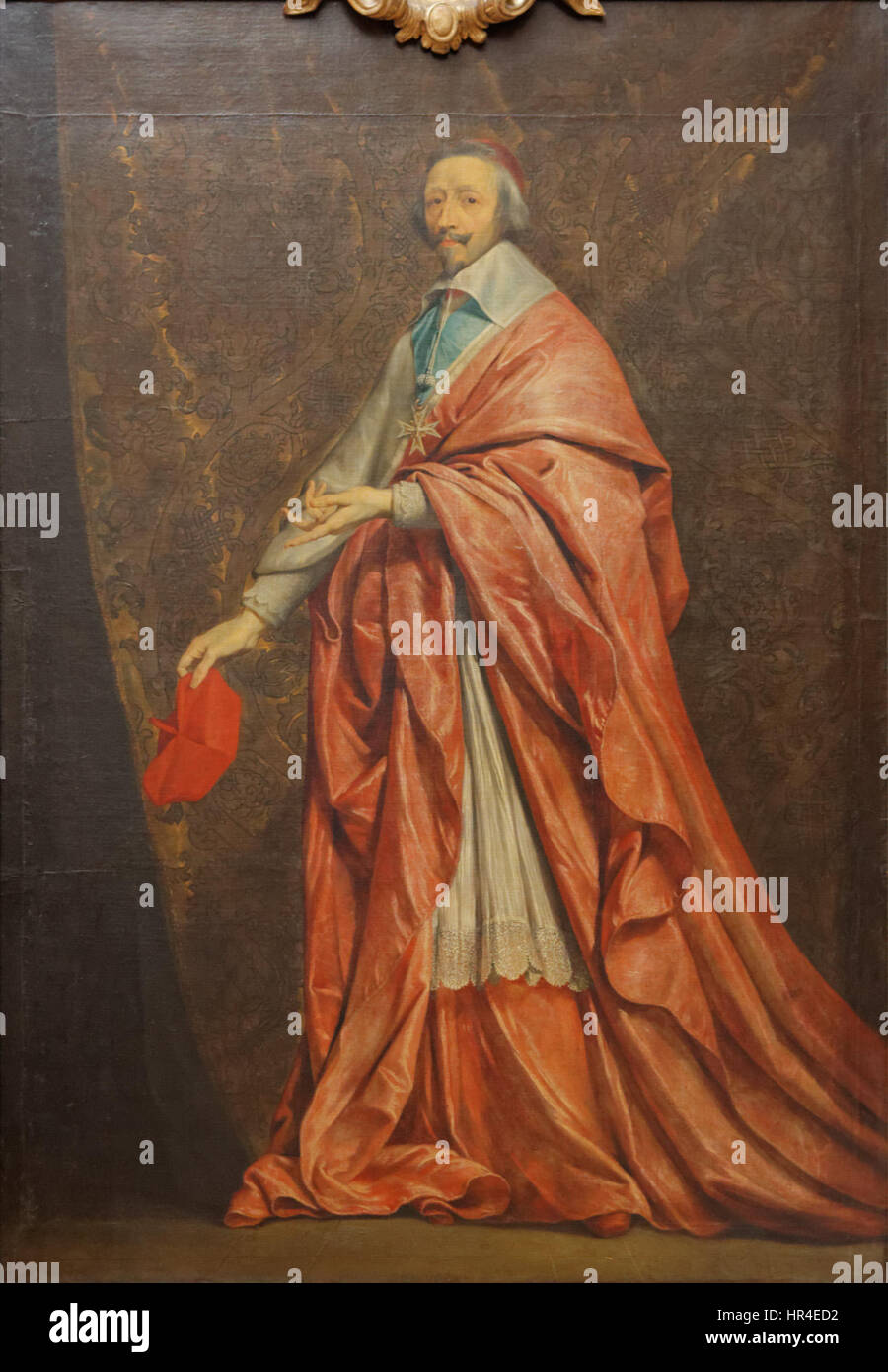 Ce portrait du cardinal de Richelieu réalisé par Philippe de Champaigne met en valeur l’influent homme d’État français du XVIIe siècle. Connu pour son rôle politique et religieux important, Richelieu est représenté avec dignité et autorité dans le style classique caractéristique de l’époque. Banque D'Images