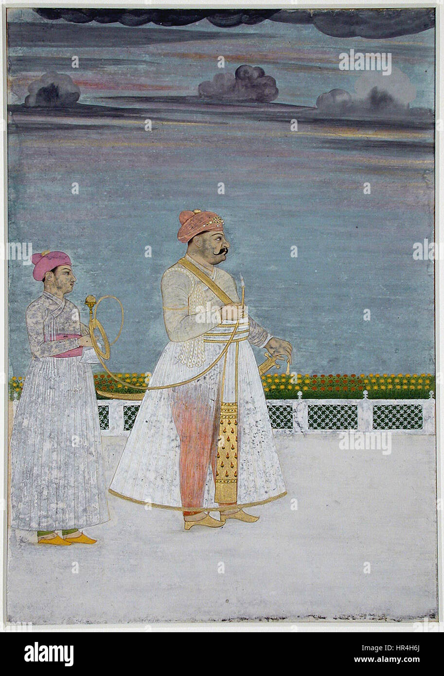 Ce portrait de Mirza Husain Raza Khan représente la figure éminente dans un style indien du XVIIIe siècle. La peinture capture l'expression et la tenue dignes du sujet, reflétant le contexte culturel et historique de l'Empire moghol. Banque D'Images