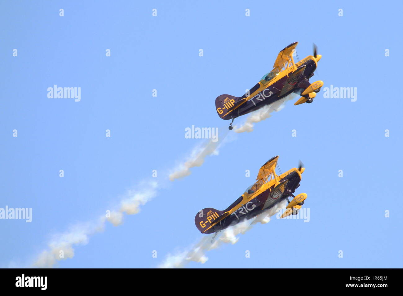 L'équipe de voltige Trig, battant Pitts Promotions (G-IIIP et G-PIII) à l'Airshow 2015 National de l'Écosse à l'East Fortune. Banque D'Images