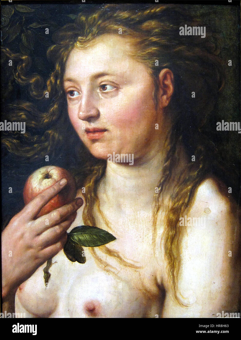 Cette pièce de Hendrick Goltzius, intitulée 'Eve', est une gravure détaillée montrant l'Eve biblique dans un moment de tentation. La composition reflète la maîtrise par l’artiste de la technique de gravure et des thèmes bibliques. Banque D'Images