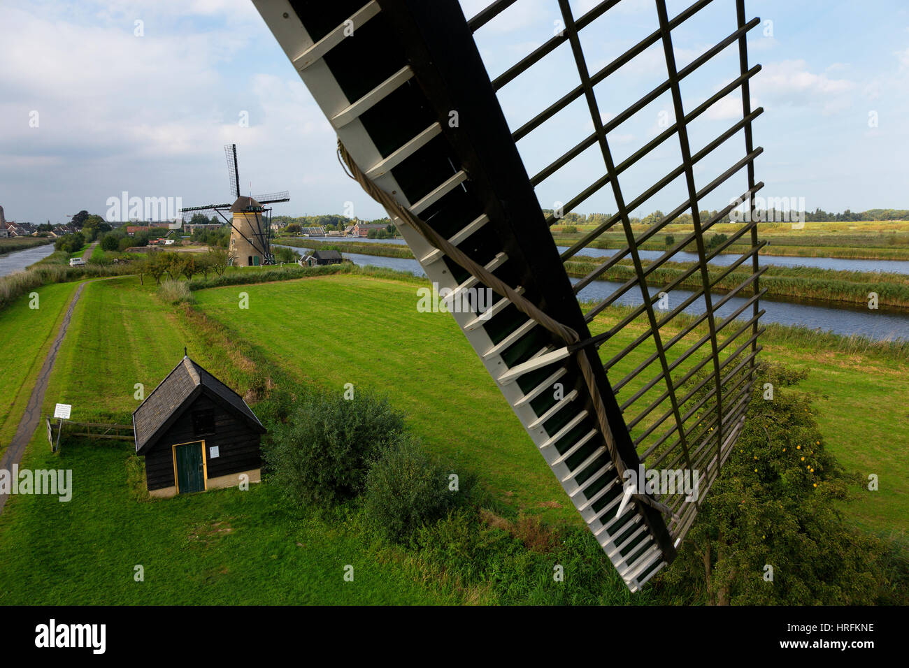 Moulin, Village de Kinderdijk, Mdenwaard, province du sud de la Hollande Pays-Bas Banque D'Images