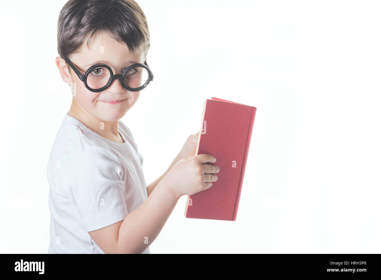 garçon, lire un livre Banque D'Images