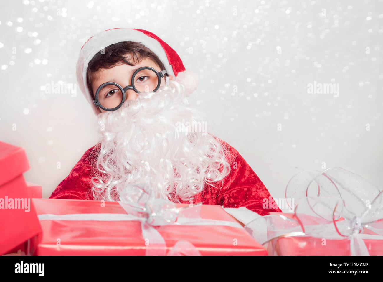 Boy dressed as Santa Claus Banque D'Images