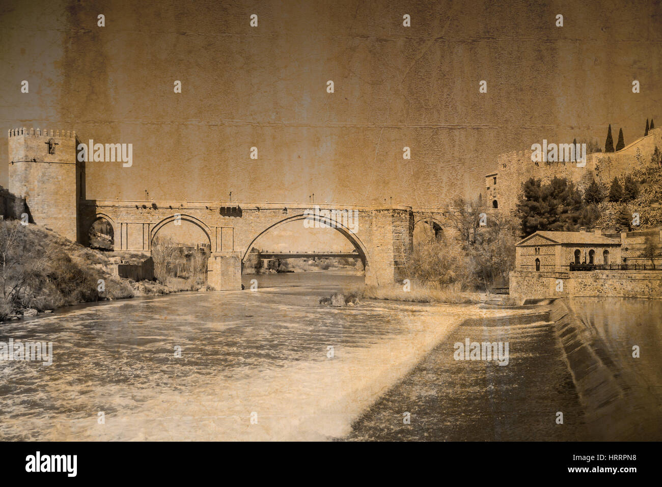 Carte postale en look vintage du pont San Martin à Tolède, Espagne Banque D'Images