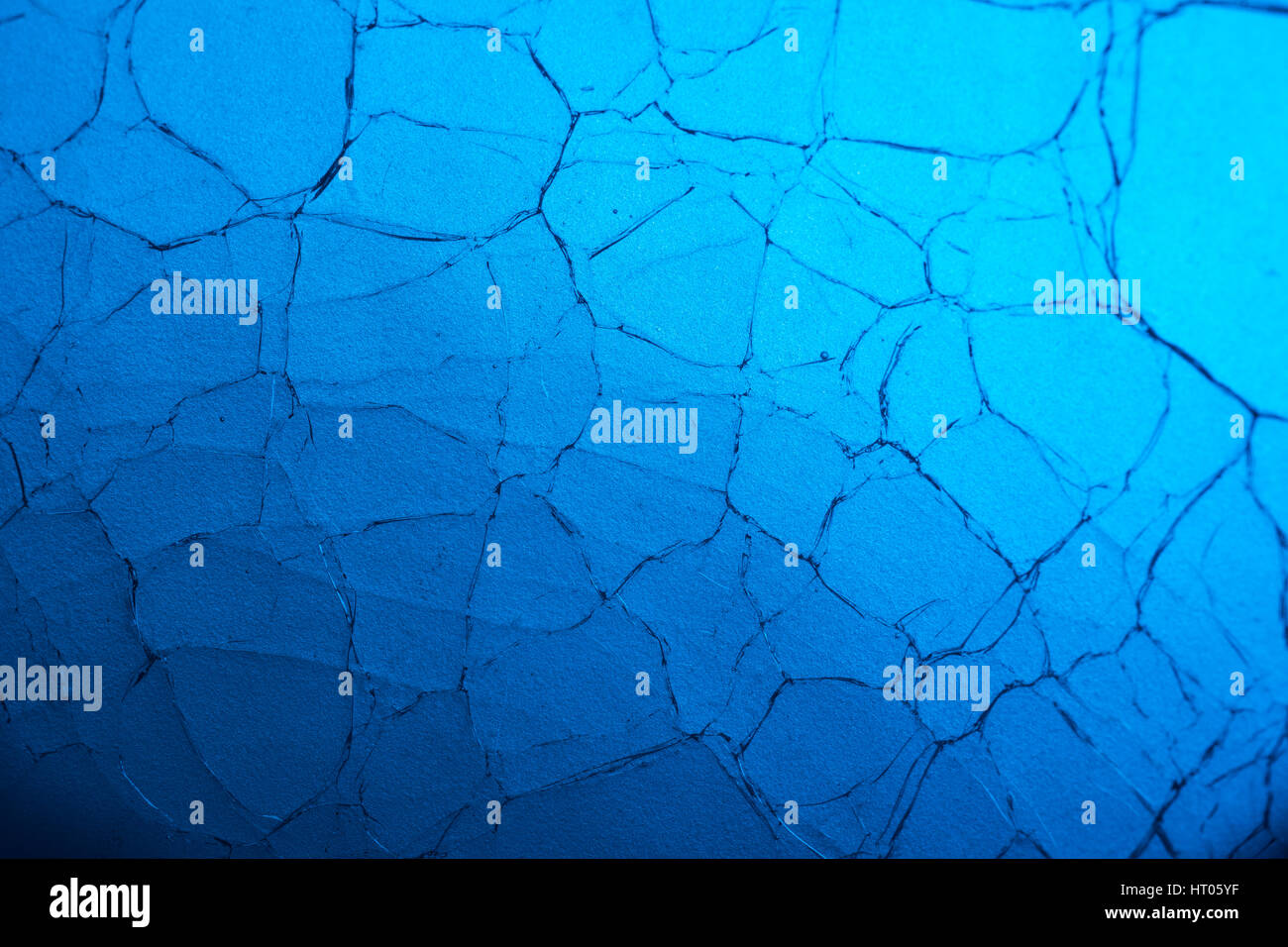 Résumé / fou verre fissuré la macro-photo. Possible métaphore de la maladie mentale, rêves brisés, de promesses non tenues, résumé, l'esprit. Banque D'Images