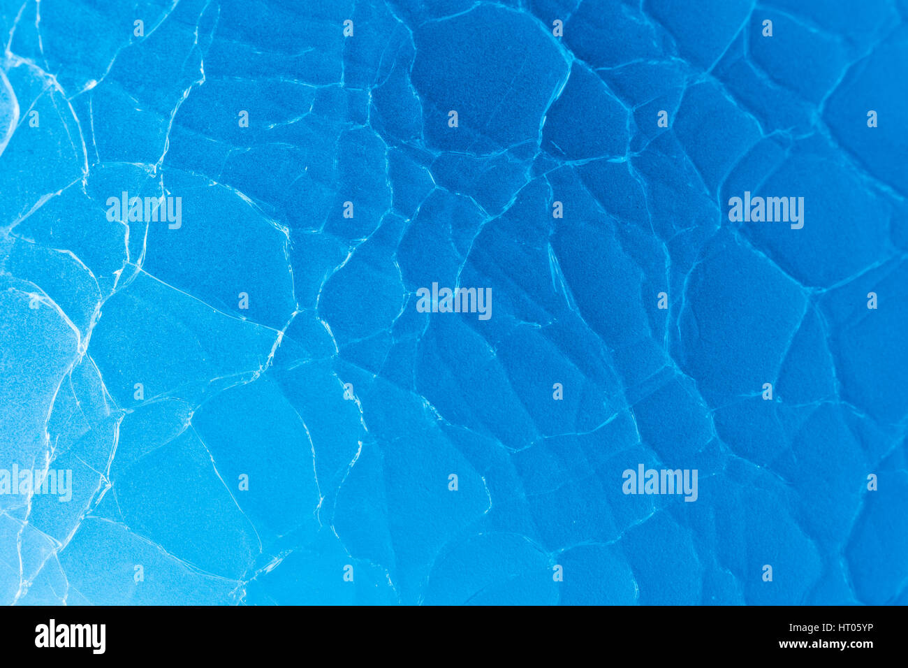 Résumé / fou verre fissuré la macro-photo. Possible métaphore de la maladie mentale, rêves brisés, de promesses non tenues, résumé, l'esprit. Banque D'Images