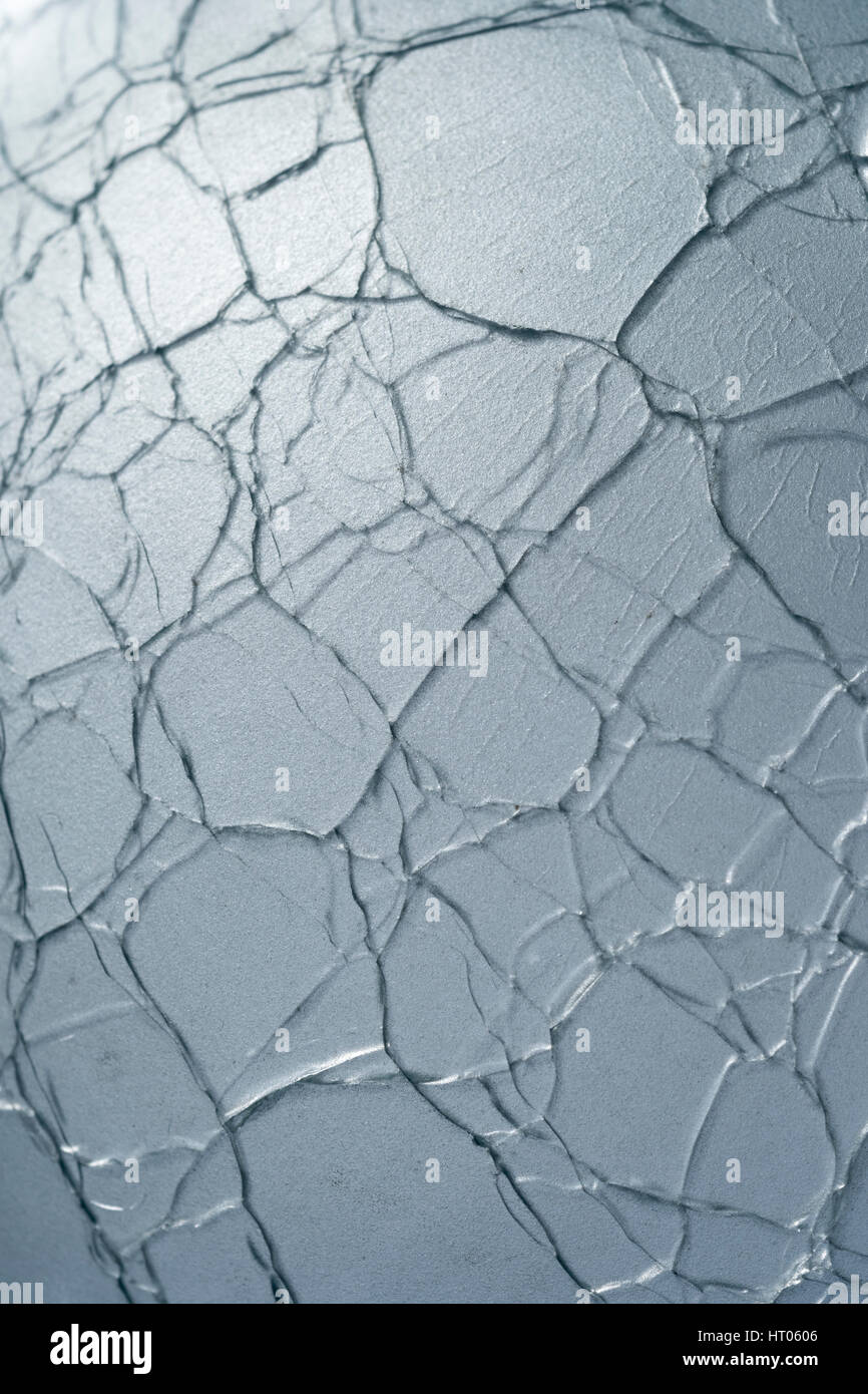 Résumé / fou verre fissuré la macro-photo. Possible métaphore de la maladie mentale, rêves brisés, de promesses non tenues, résumé, l'esprit. Banque D'Images