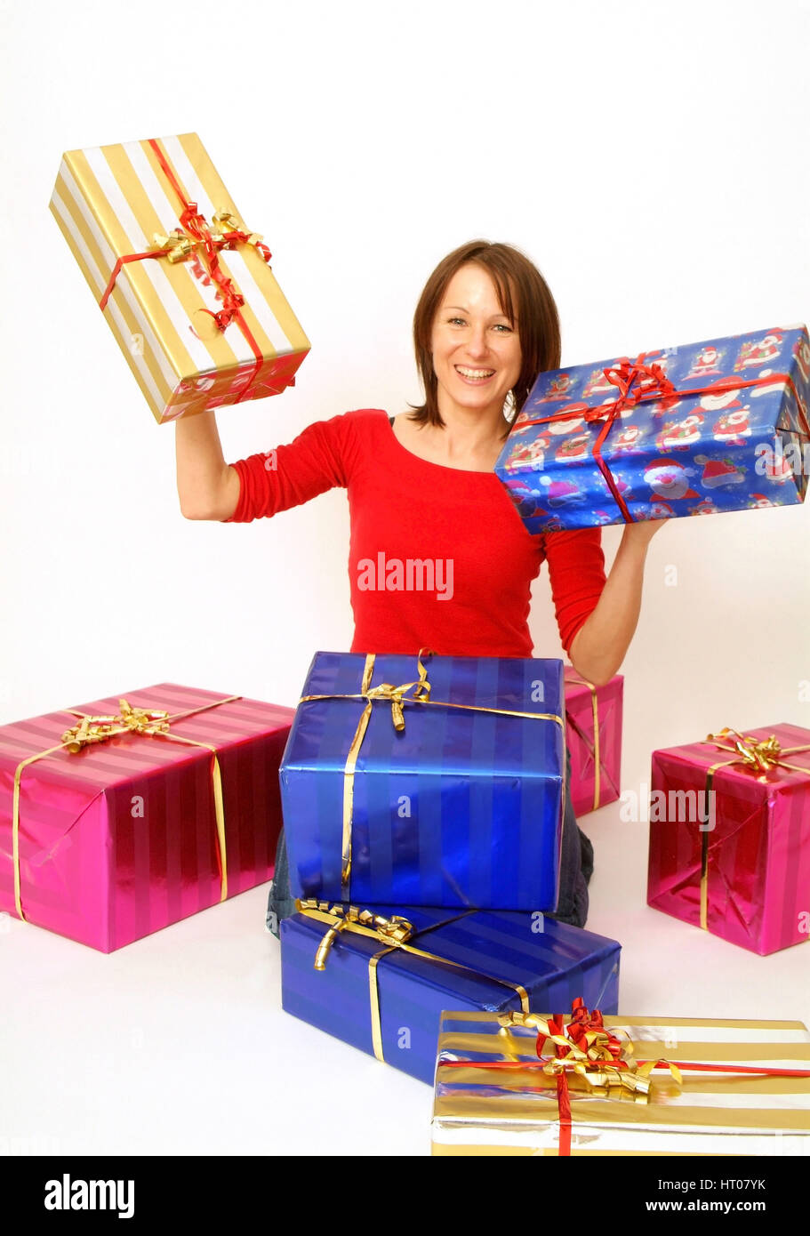 Frau mit Weihnachtsgeschenken - woman with christmas presents Banque D'Images