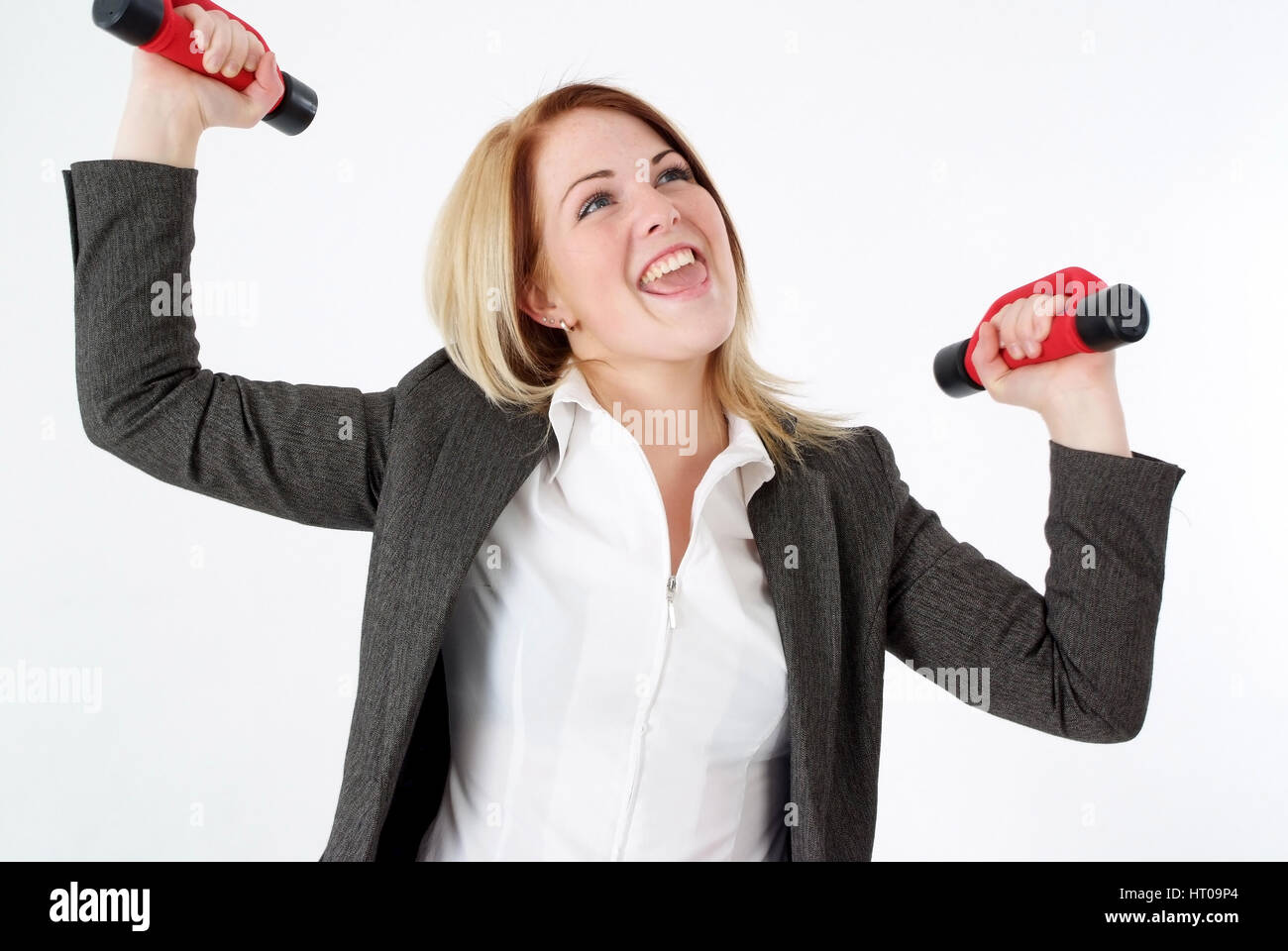 Geschoeaeftsfrau Hanteln Powerfrau, mit - business woman with dumbbells Banque D'Images