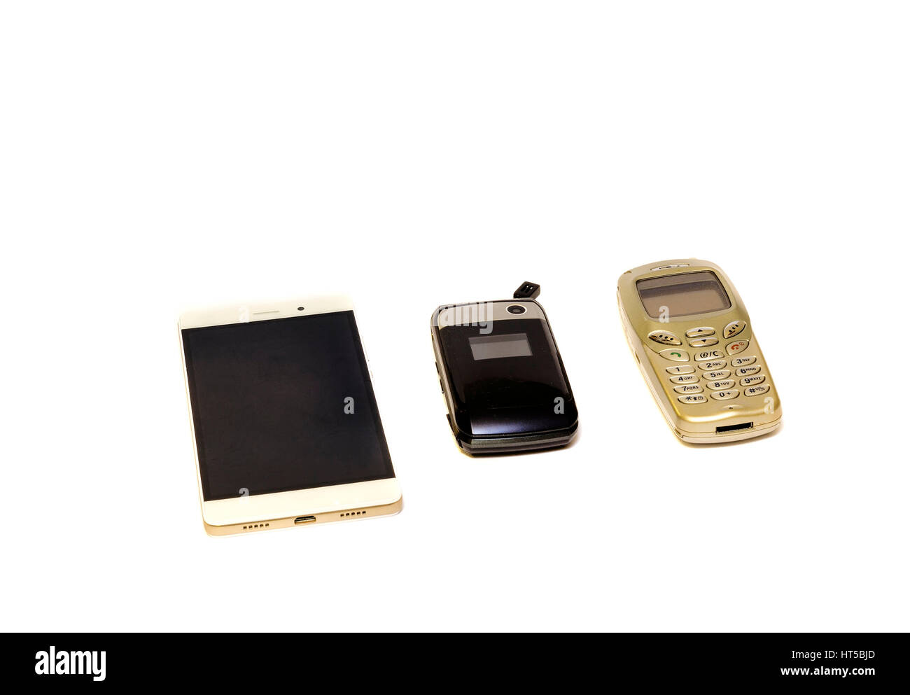 Téléphone cellulaire evolution.trois téléphones cellulaire isolé sur fond blanc Banque D'Images