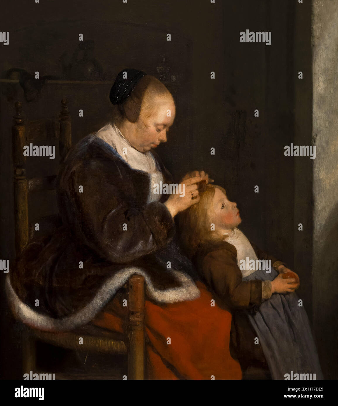 Mère peignant ses cheveux de l'enfant, la chasse aux poux, par Gerard Ter Borch le jeune, vers 1652, Musée des beaux-arts, Musée Mauritshuis, La Haye, Netherla Banque D'Images