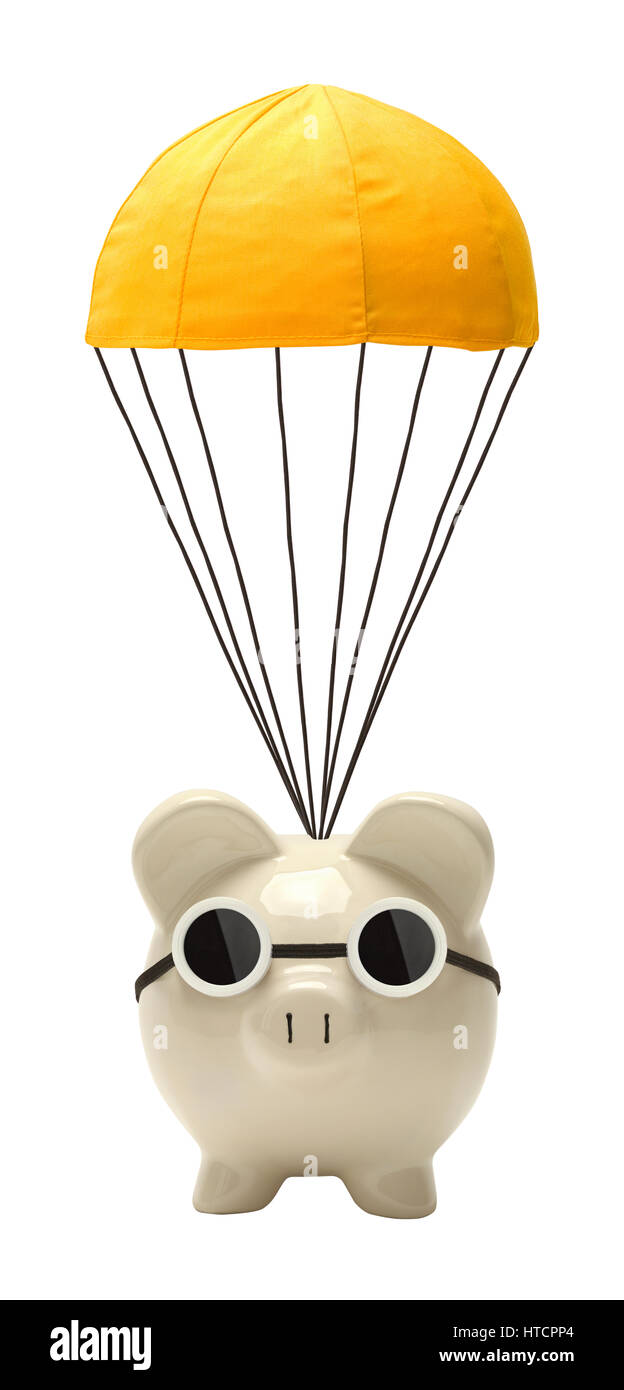 Tirelire avec parachute doré flottant isolé sur blanc. Banque D'Images
