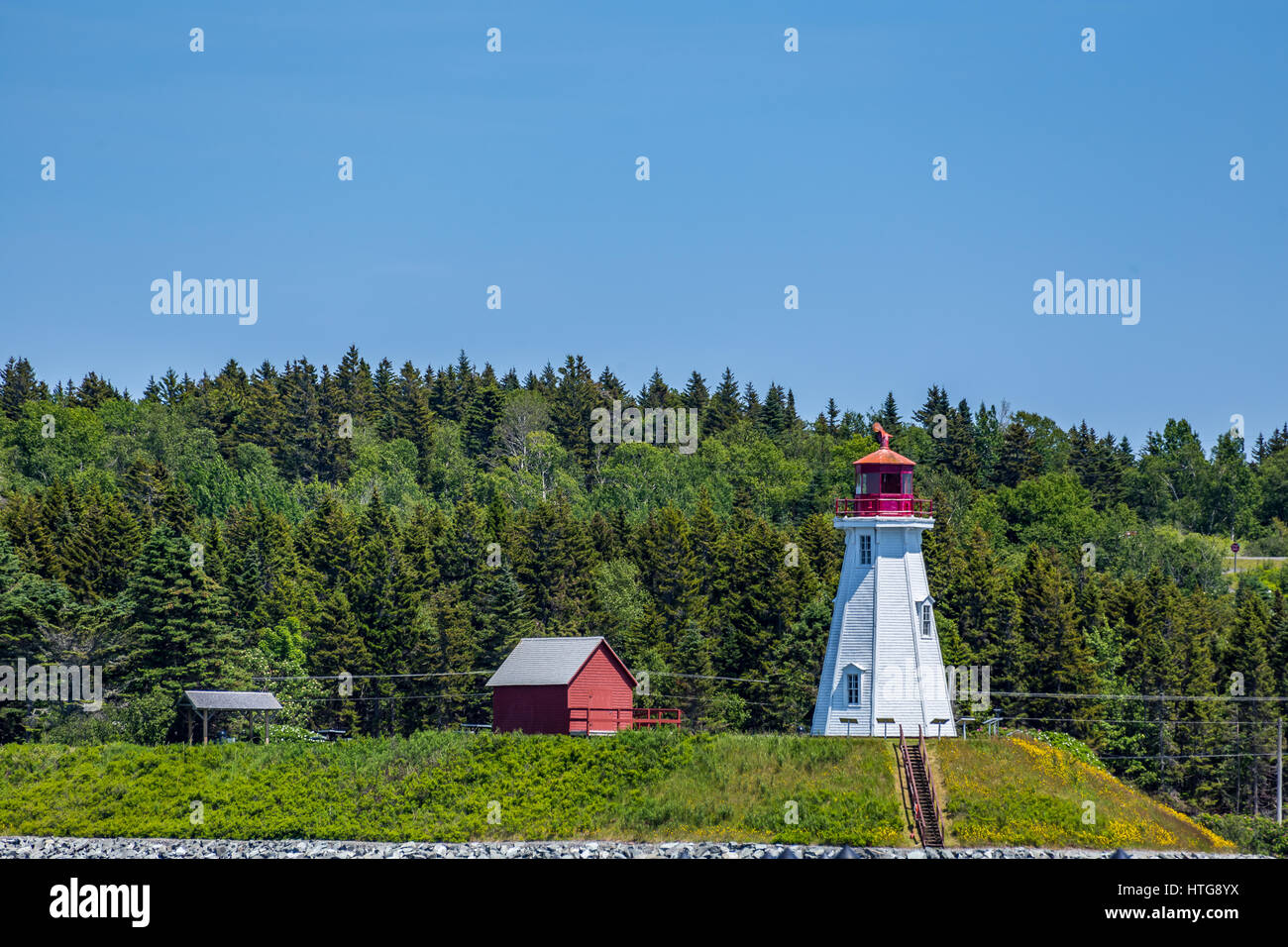 Mulholland Point Light est un phare sur l'île Campobello, au Nouveau-Brunswick , Canada. Construit en 1885, il se situe sur la rive est du canal de Lubec Banque D'Images
