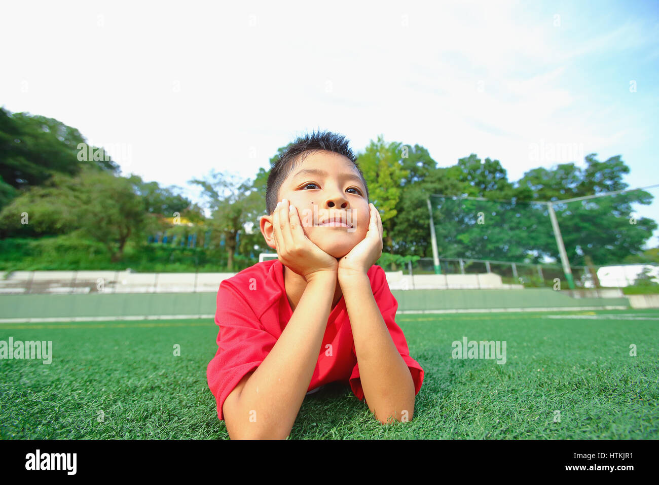 Terrain de soccer kid au japonais Banque D'Images