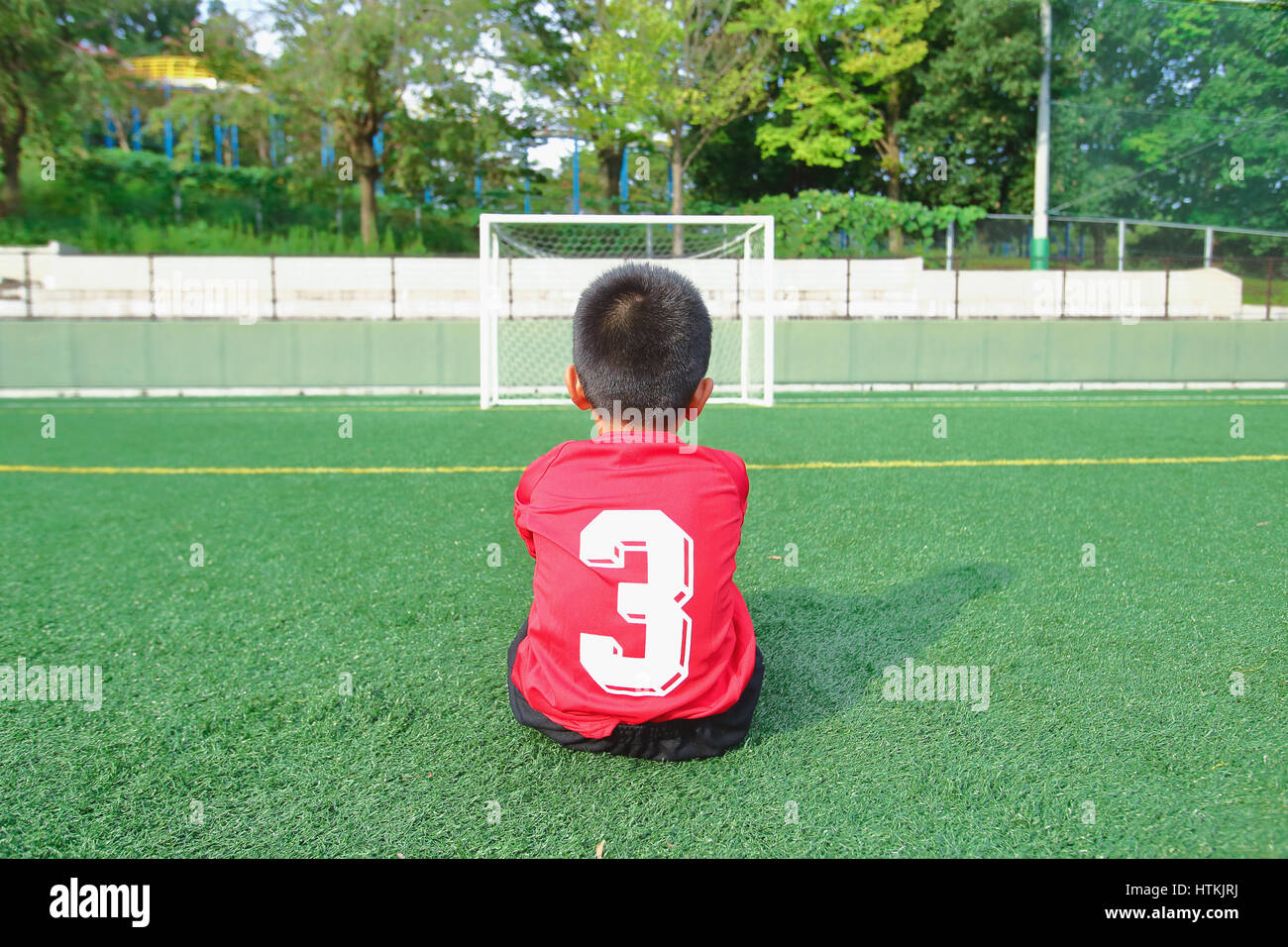Terrain de soccer kid au japonais Banque D'Images
