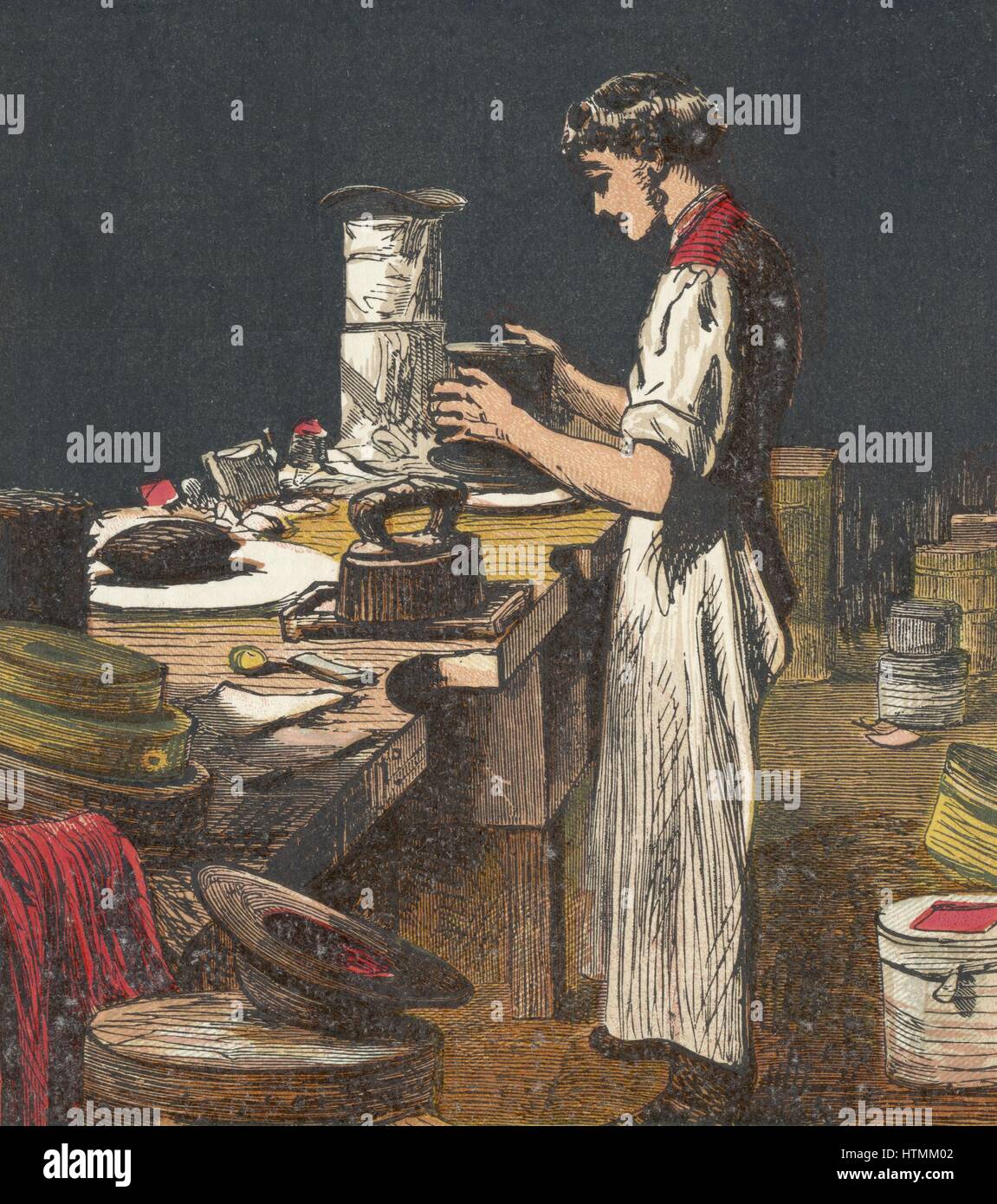Chapeaux de soie. Hatter met sur soie black hat. Dans le centre historique sont deux chapeaux haut fini recouvert de papier argenté pour la protection. Chromolithographie à partir d'un livre pour enfants publié en anglais de 1867. Banque D'Images