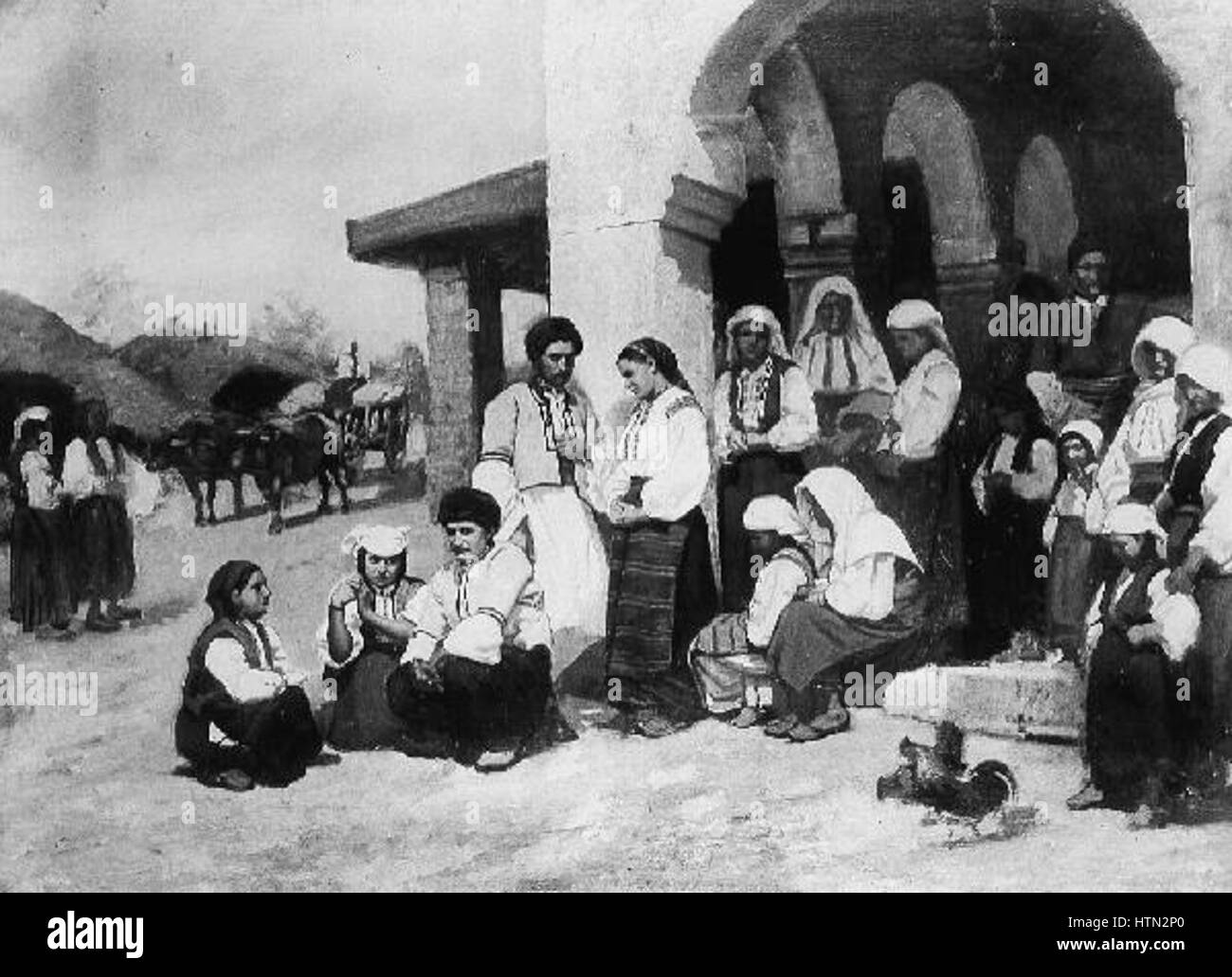 « Z Balkanskeho Mestecka » de Josef Huttary illustre la vie quotidienne et la beauté architecturale d'une ville balkanique au XIXe siècle. La peinture reflète les caractéristiques culturelles et architecturales de la région, avec une attention particulière à l'atmosphère et à la vie locales. Banque D'Images