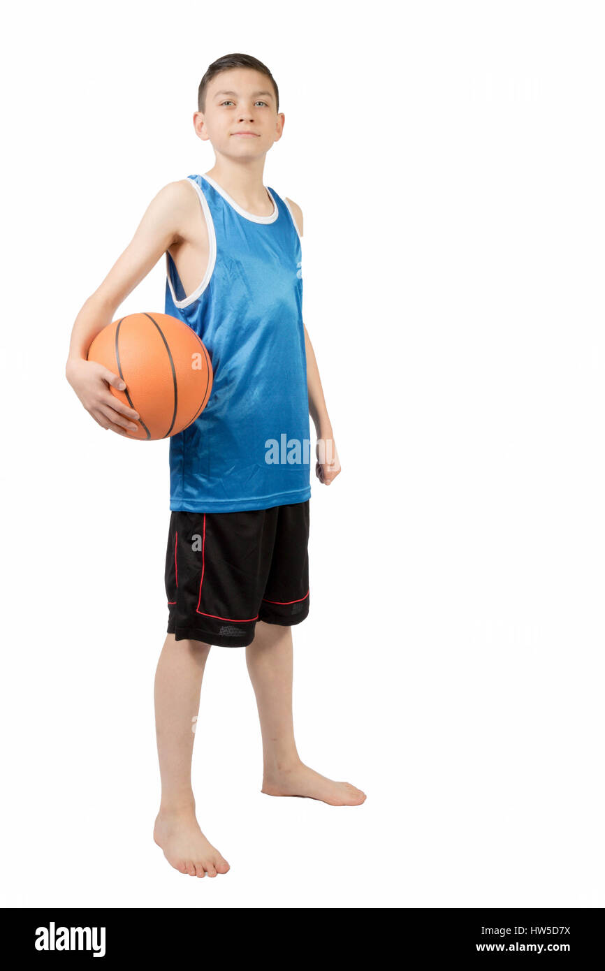 Young caucasian teenage boy with a basket-ball Banque D'Images